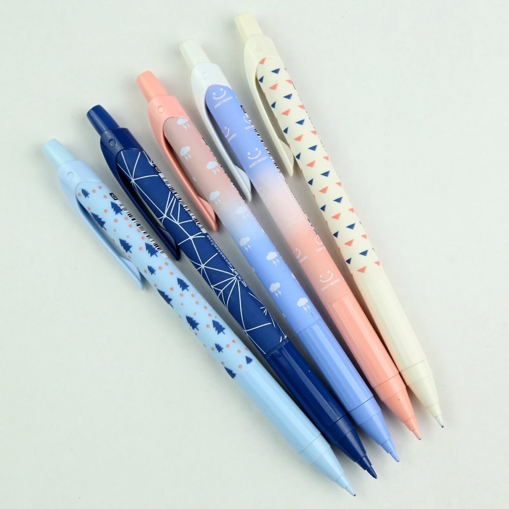 pens with pastel patterns like clouds and trees 