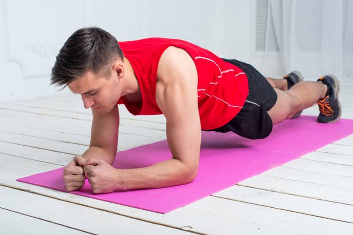 a man planking on the floor