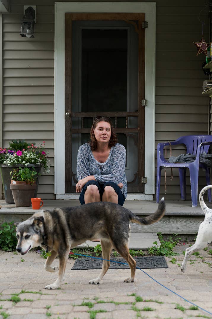 Courtney True with two of her dogs at her home in Maine.