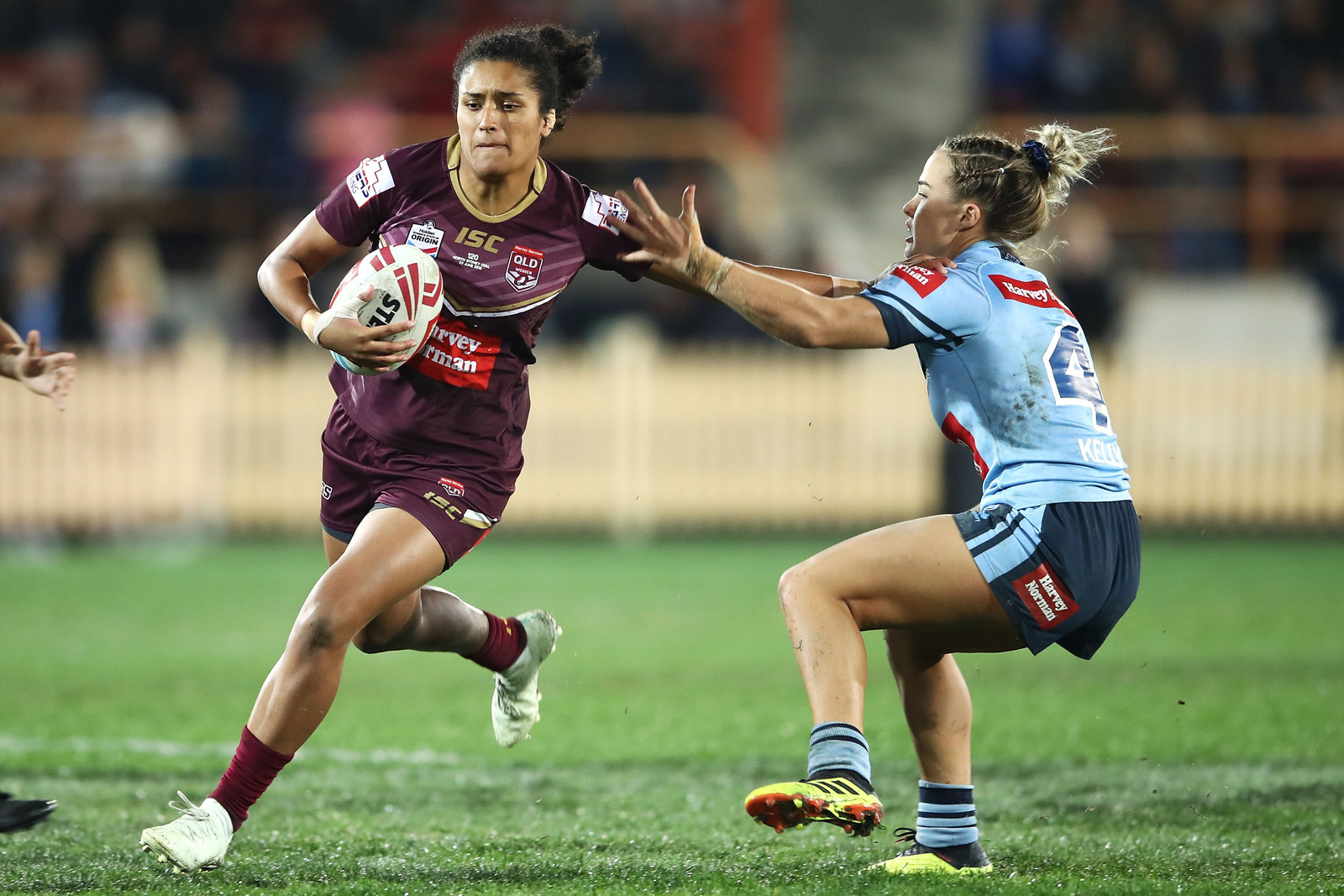 State of Origin women flaunt figures in bikinis during the NRL game