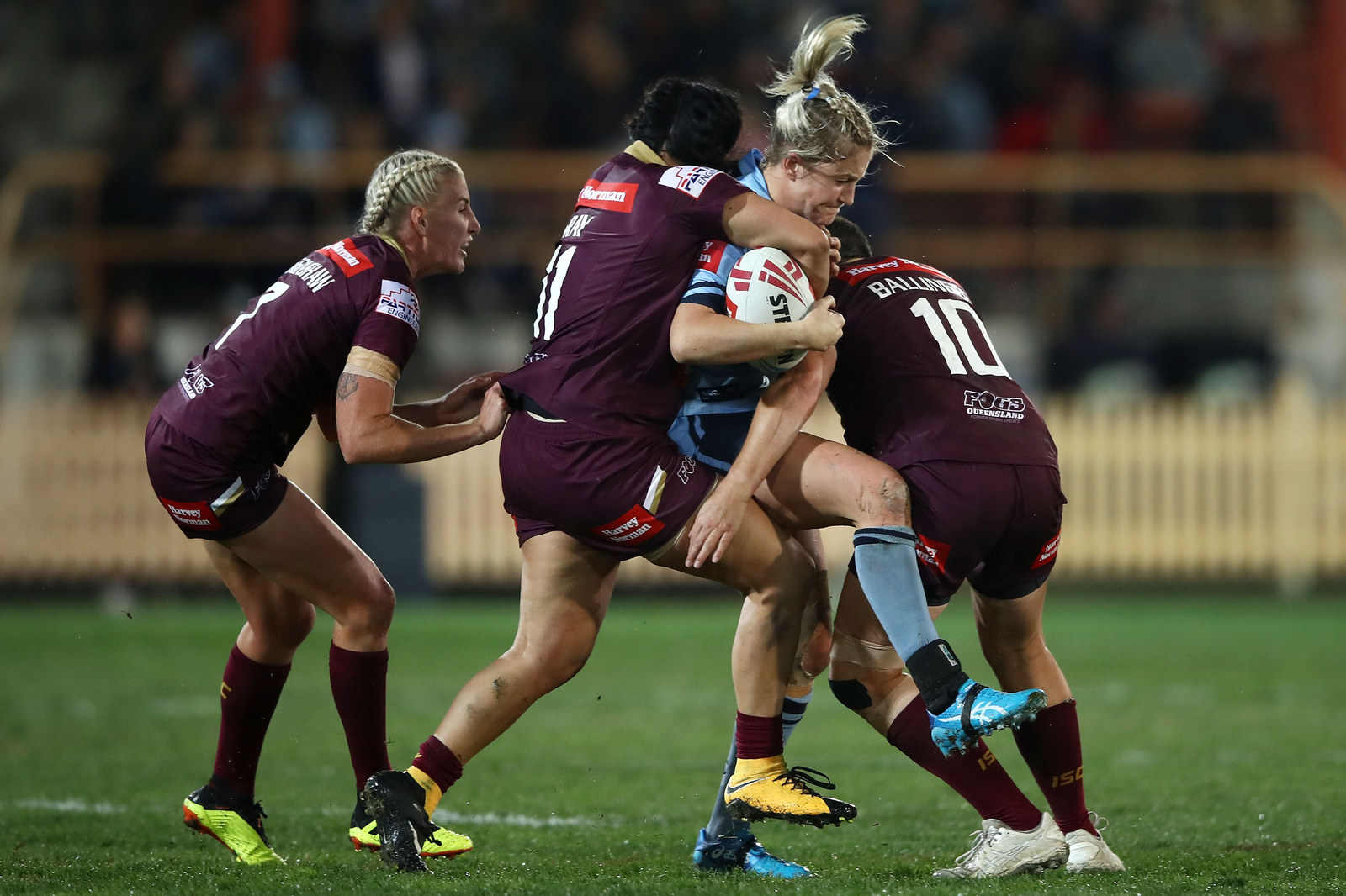 State of Origin women flaunt figures in bikinis during the NRL game