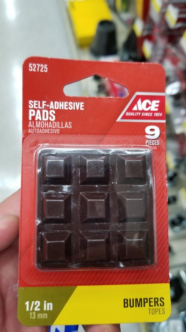 Self-adhesive pads in a pack that look like a chocolate bar