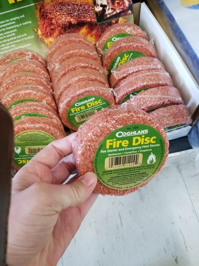 A fire disc/starter in a pack that looks like a hamburger patty