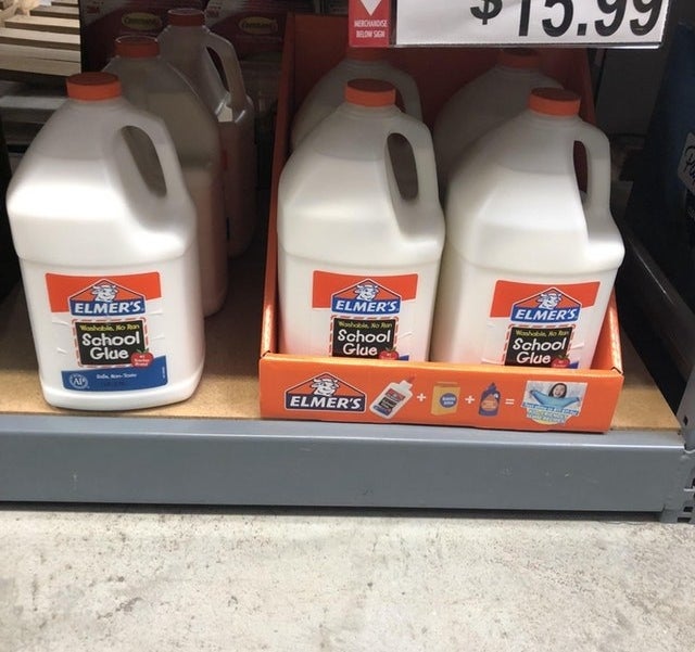 Elmer&#x27;s School Glue on a shelf in containers that look like milk jugs