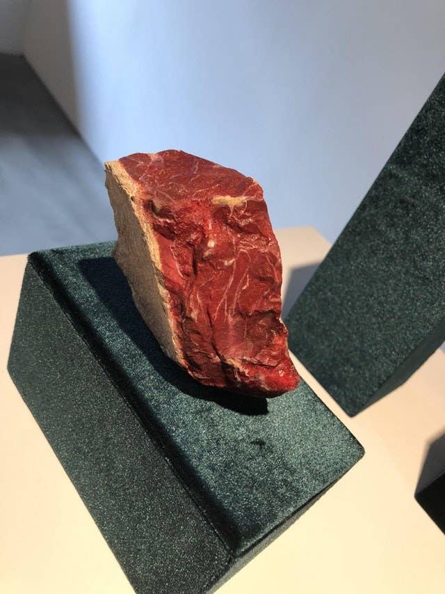 A large rock that looks like marbled steak