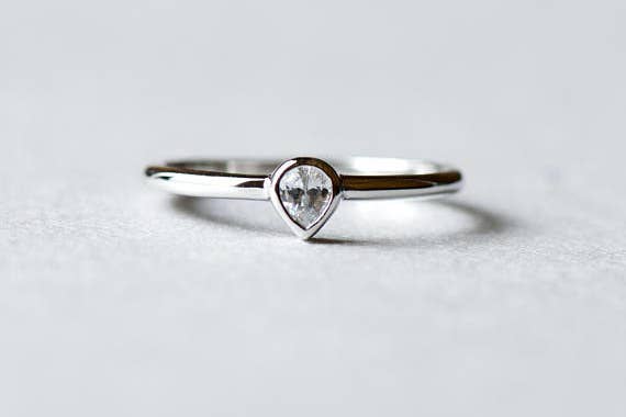the ring with the pear-shaped diamond