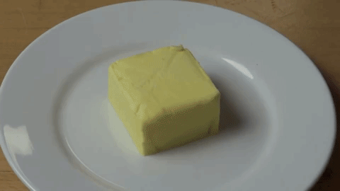 Warm up a glass by filling it with hot water, dump the water out, then place it over a chunk of cold butter (a full stick might be too big). After a minute or two, the butter will be soft enough to spread.More: How To Soften Butter ASAP