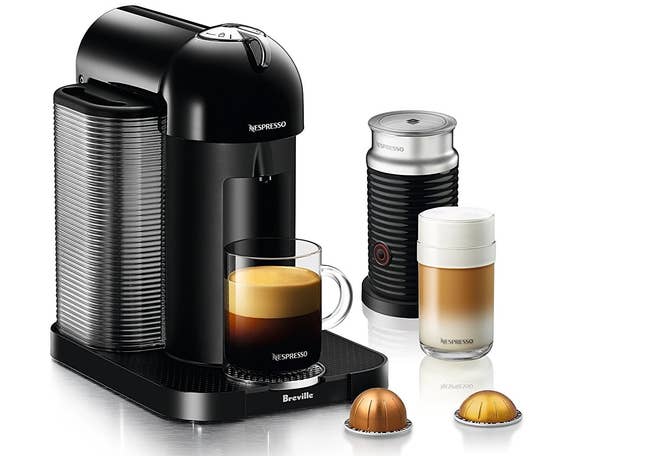 The machine, plus two Nespresso pods and the aeroccino milk frother