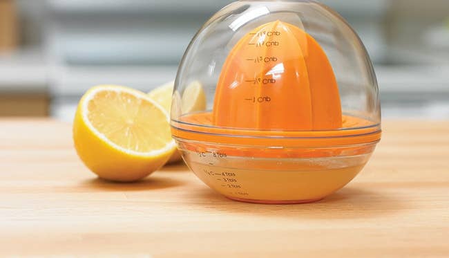 The clear and orange juicer