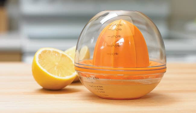 The clear and orange juicer