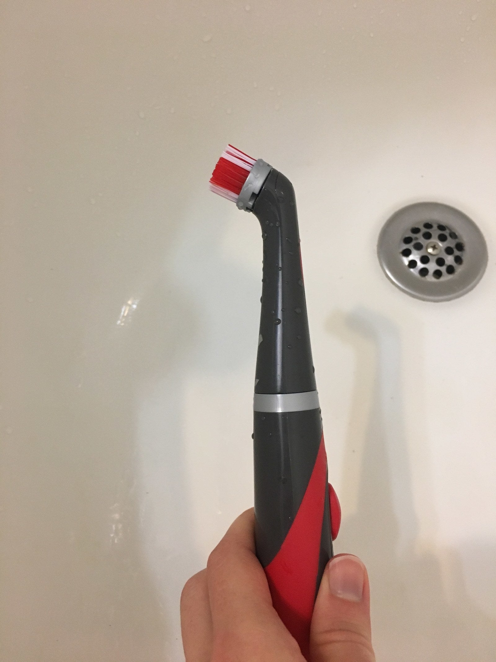 No joke, this Rubbermaid 'electric toothbrush' for cleaning restored my  orange grout back to white