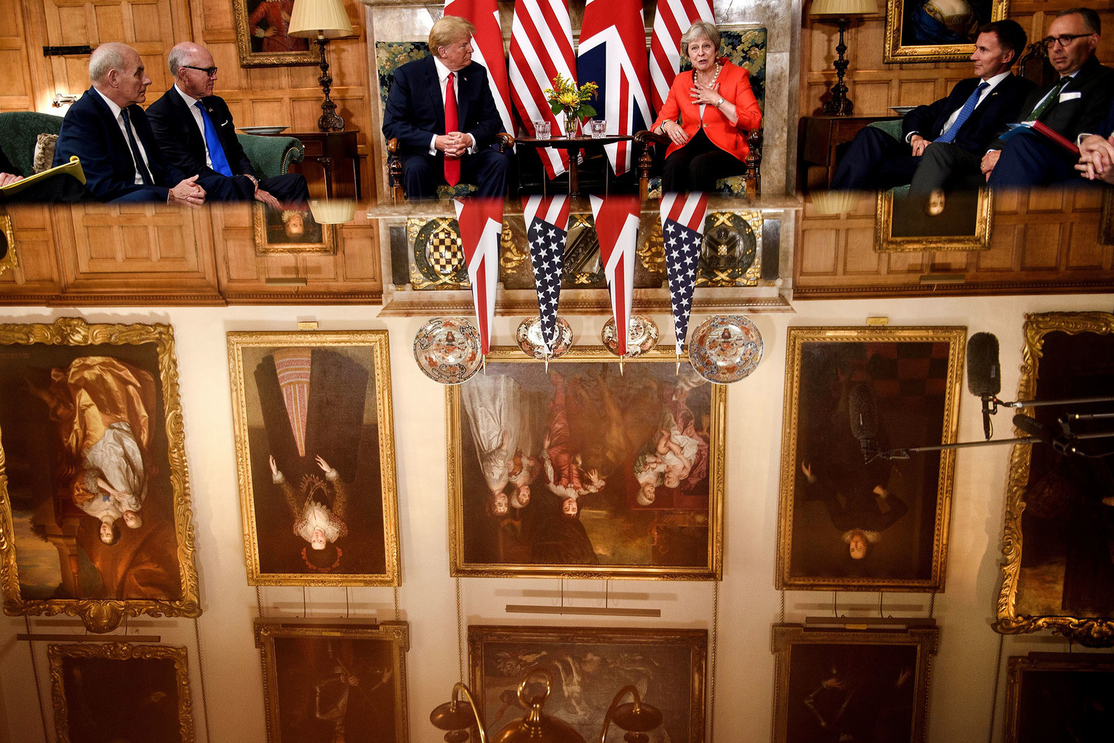 President Donald Trump and Britain's Prime Minister Theresa May prepare for a meeting at Chequers, the prime minister's country residence, northwest of London, July 13.