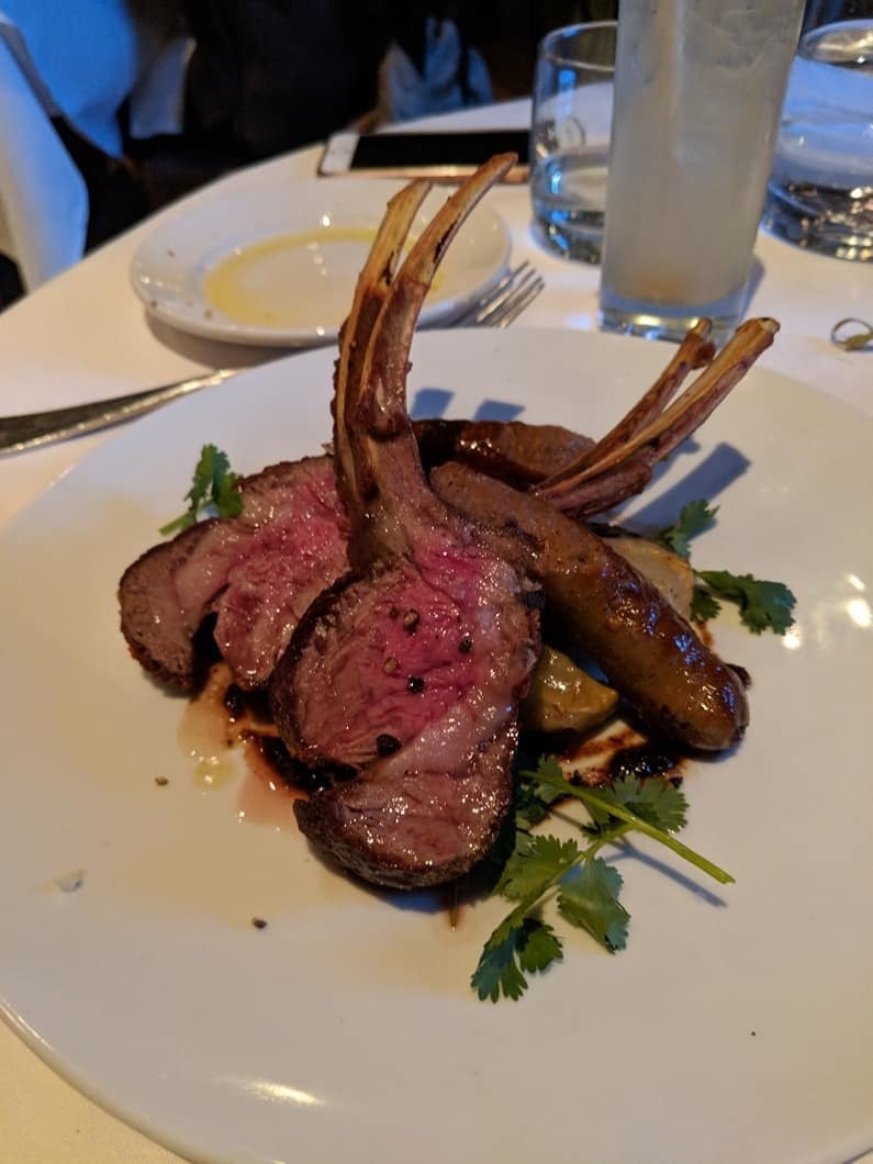 Another standout dish is the rack of lamb served with juicy merguez sausages, braised fennel, roasted bread, pecan, cumin, and date relish. The lamb is cooked perfectly to the temperature of your liking. Savor each and every bite until you realize you are licking on an empty plate.