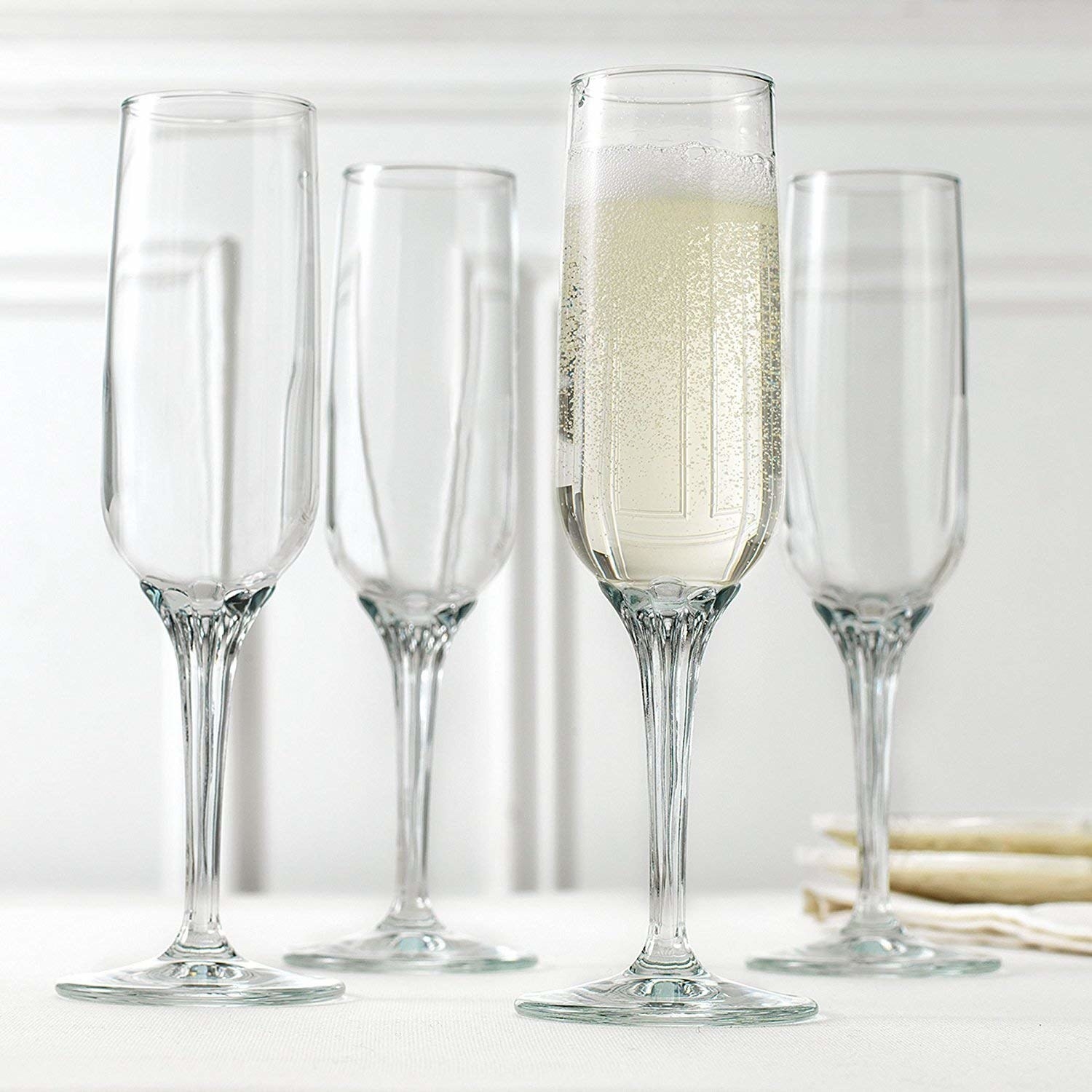 Promising review: "Classic, sturdy, and stylish. These were ordered and used during our New Year's Eve celebration and will be used again this year if all goes well in life. Would definitely recommend." —Amazon CustomerGet a set of four from Amazon for $26.99.