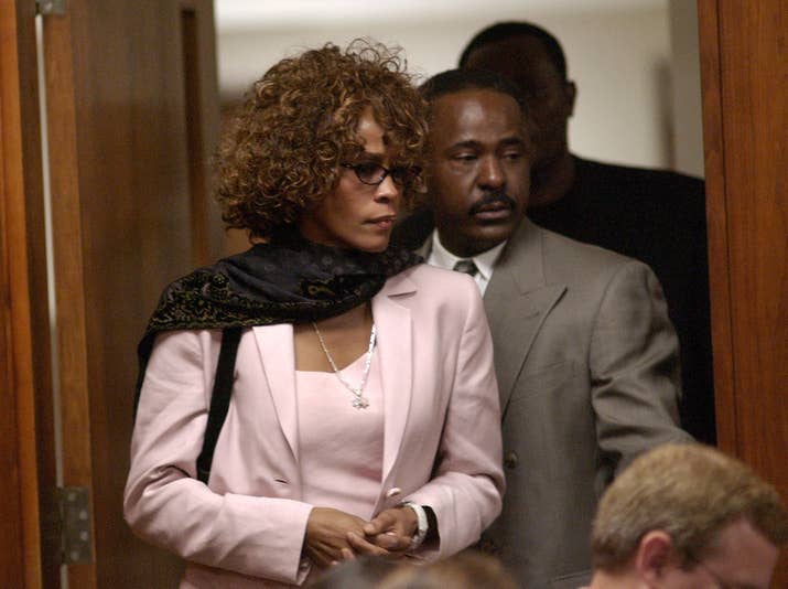 Houston enters the courtroom for Brown&#x27;s probation violation hearing on Aug. 27, 2003.