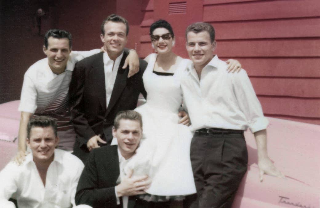 Scotty Bowers (second from left in top row) with friends