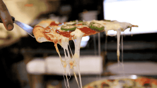 The slice to get here is the pepperoni and jalapeño, which Dave and Erin claim is the "perfect spicy/savory combo." Plus just look at that cheese pull!