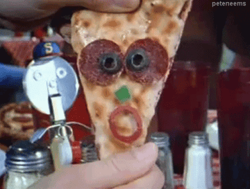 A GIF of Pizza Head (a slice of Pizza with a face made of toppings) being stretched out.