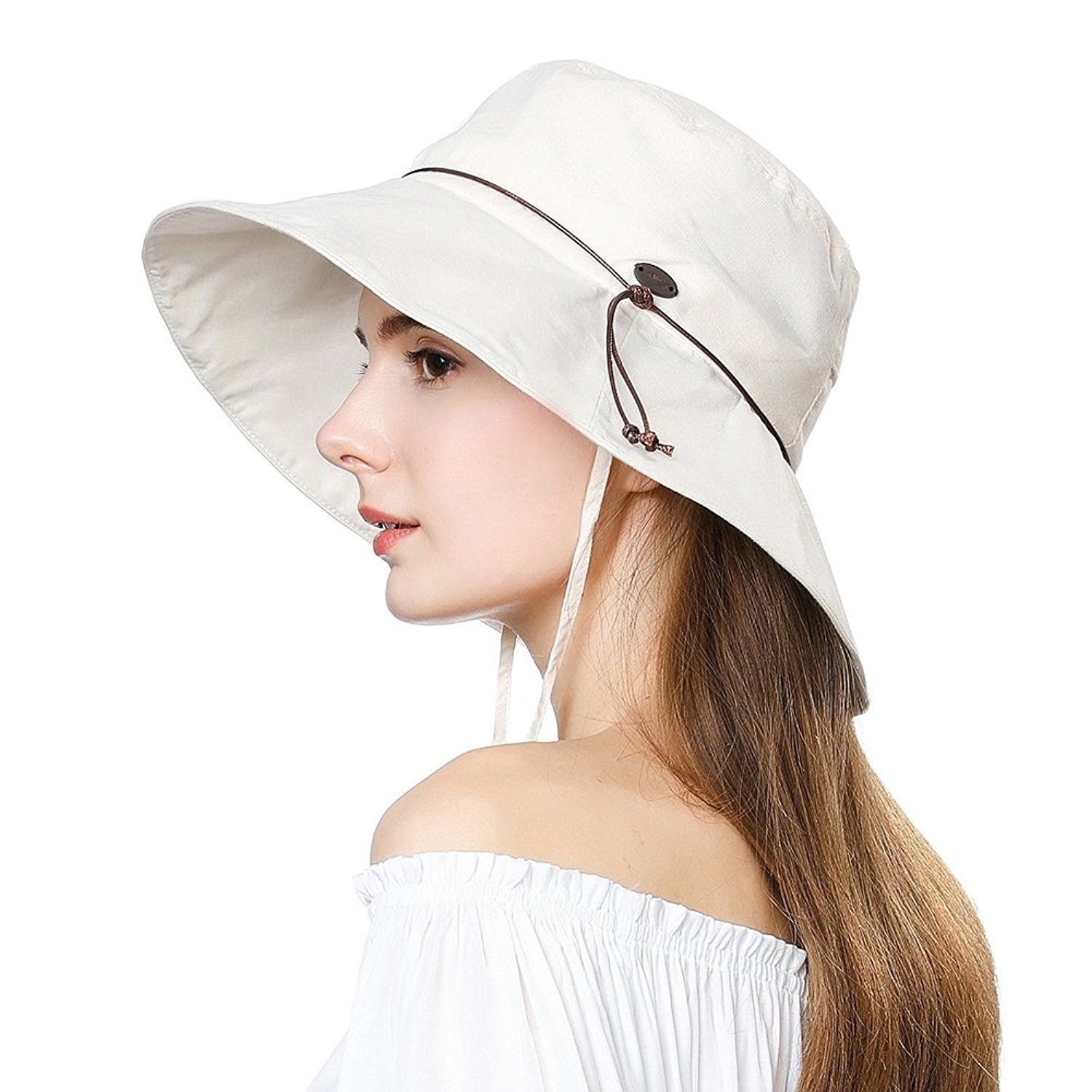 Promising review: "Love it! I bought two — one for me and one for my daughter. We wore them every day at the beach. No sunburned faces! They look cute on, and the brim can be molded any way to suit you. The removable chin strap is great for windy days at the beach, and the adjustment inside the hat makes it fit perfectly to your head size." —Cynthia C. Wallace Get it from Amazon for $19.98+ (available in sizes M–L and five colors).