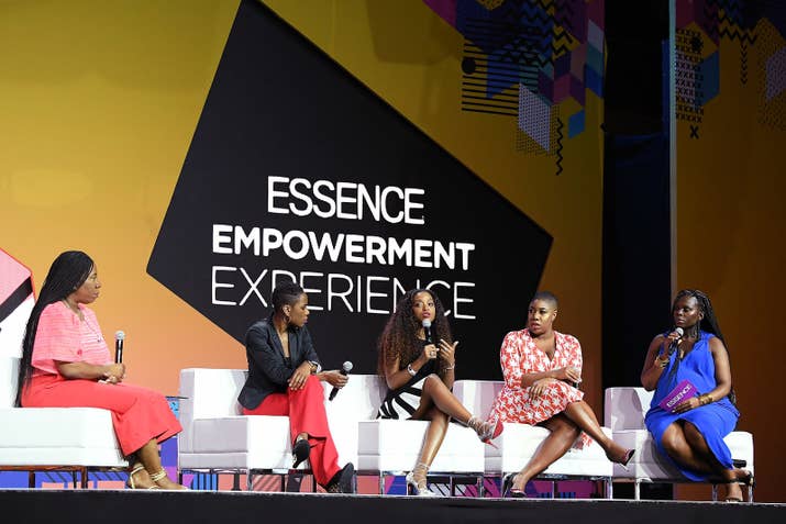 Tarana Burke, Luvvie Ajayi, Tamika Mallory, Symone Sanders, and Yolanda Sangweni speak onstage Friday during the 2018 Essence Festival.