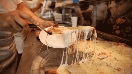 This 'za spot is open until 4 a.m. every. day. of. the. week. And as Dave and Erin show, it's finger-kissing good pizza.