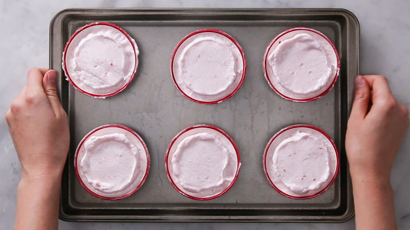 Servings: 6INGREDIENTSCrème Anglaise1 cup milk1 cup heavy cream½ cup sugar, divided½ vanilla bean pod, slit down the middle (or 1 teaspoon vanilla extract, added while cooling)4 large egg yolksPinch of saltStrawberry Soufflés1 cup hulled and quartered strawberries⅓ cup plus 4 tablespoons sugar, divided1 teaspoon lemon juice1 tablespoon butter, softened 4 large egg whites¼ teaspoon cream of tartarPinch of saltPREPARATIONPreheat the oven to 400˚F (200˚C)Prepare an ice bath and place a strainer over a medium bowl. Set nearby.Make the crème anglaise: In a small saucepan, heat the milk, heavy cream, ¼ cup of sugar, and the vanilla bean pod over medium heat for 2-3 minutes, until it begins to steam. Remove the pan from the heat.In a medium bowl, combine the egg yolks, remaining ¼ cup of sugar, and the salt and whisk together. Continue whisking and ladle in about 1 cup of the milk mixture. Once combined, return the saucepan to medium heat, begin to whisk the milk mixture, and slowly pour in the egg mixture. Cook the custard, continuously whisking to ensure the egg yolks don’t cook on the bottom, for about 5 minutes, until it coats the the back of a spoon. Set the bowl with the strainer in the ice bath and strain the creme into the bowl. Whisk until cooled, about 5 minutes. Cover and refrigerate until ready to serve.Add the strawberries, 2 tablespoons of sugar, and the lemon juice to a small saucepan. Cook over medium heat for about 5 minutes, stirring occasionally, until the strawberries are softened but still vibrant red. Remove the pan from the heat.Strain the strawberry mixture through a fine-mesh sieve into a medium bowl. Use a spatula to press the berries through, making a strawberry puree. Discard the pulp and set the puree in the refrigerator to cool.Set 6 ramekins on a baking sheet and coat the insides with the softened butter. Sprinkle 2 tablespoons of sugar among the ramekins and shake each to coat the bottom and sides with sugar.Add the egg whites, cream of tartar, and salt to a large bowl. Using an electric hand mixer, beat the whites on medium-high speed until foamy. Add the remaining ⅓ cup of sugar in small increments, continuing to beat until the whites are stiff and glossy. Using a spatula, carefully fold in the strawberry puree. Fill each ramekin with the strawberry-egg white mixture and level off the tops with a butter knife. Run a clean thumb around the inside edge of each ramekin to allow the soufflés to rise properly.Bake the soufflés for 10-12 minutes, until the tops are light brown. Avoid opening the oven prematurely, so the soufflés don’t fall. Serve the soufflés immediately with the crème anglaise poured over the top.Enjoy!Inspiration: https://www.happyandharried.com/2017/05/19/strawberry-souffle/https://cooking.nytimes.com/recipes/1018501-red-berry-souffle?action=click&module=Collection%20Band%20Recipe%20Card&region=Souffle%20Recipes&pgType=guide&rank=2https://www.marthastewart.com/258803/creme-anglaisehttps://cooking.nytimes.com/recipes/7712-creme-anglaise