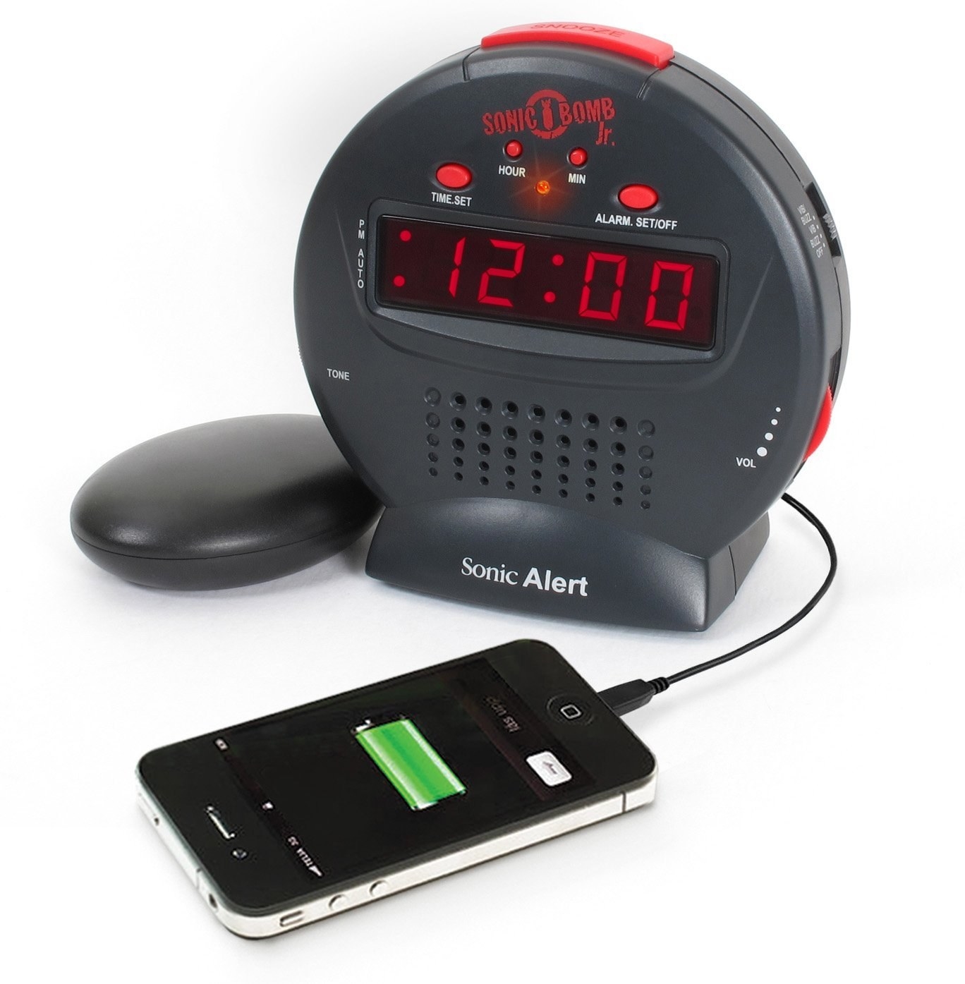 red alarm clock with plug