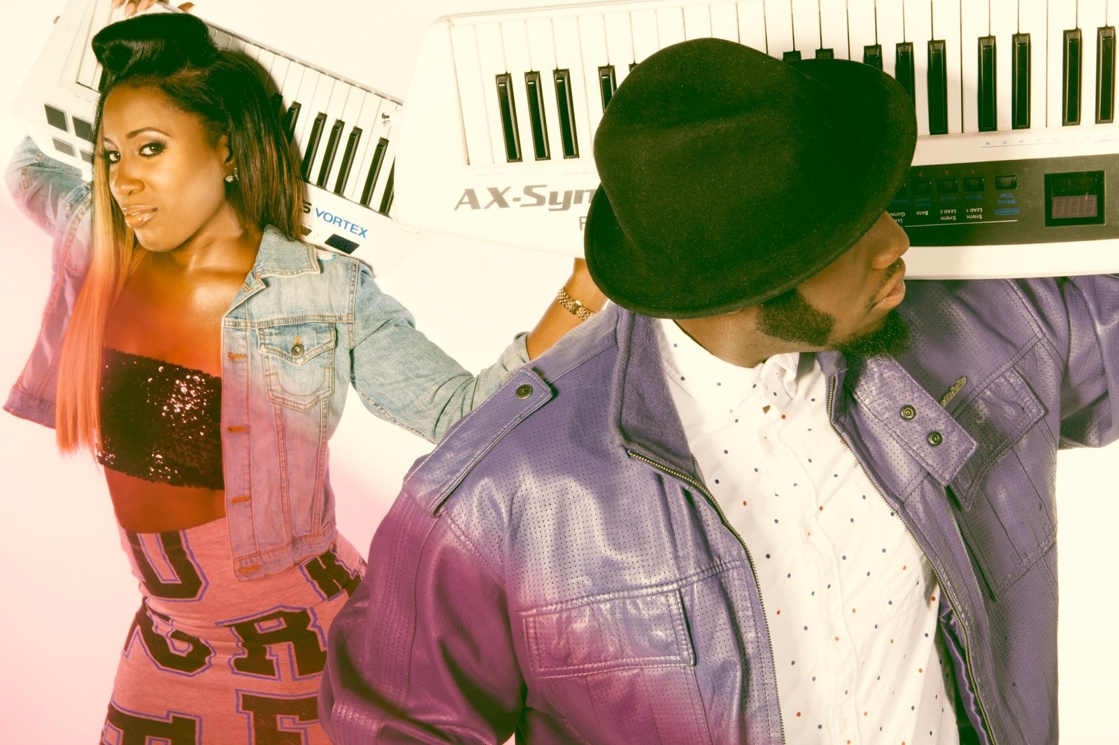 The year may be almost over but The APX's ascent through 2018 continues as the husband/wife duo release their music video for their new single “Jupiter.” 'Electrik Funk', Dee Rhodes and Erika Rhodes’ 1st studio project, was released last year with amazing worldwide reception and now they are following it up with their recently released funky single “Jupiter”. Like many of their past releases, “Jupiter” takes you back to a time when funk ran supreme! The song was written earlier this year and quickly became a fan favorite as The APX performed it live during their recent west coast tour. Inspired by earlier married funk duos that came before them such as Yarbrough and Peoples, Ashford and Simpson and more, The APX harnesses the sound of a pulsating synth bass with powerhouse funky vocals on top to bring you a special dose of boogie, funk and soul you’ve been missing! They now present their upcoming second self-edited music video for ”Jupiter.” Taking inspiration from early 80s music videos from some of their favorite bands like Cameo, The APX dives into a retro, and colorful new world. The video features sexy robots, kaleidoscopes, rockets, outer space, astronauts and of course the keytar-wielding/synth playing duo themselves! Even their pet poodle Teddy makes a celebrity appearance. Filmed on green screen in Atlanta’s legendary Studio Space, "Jupiter" showcases the spontaneous Dee and Erika making their way thru an adventurous new fantasy world of their adaptation of what planet Jupiter would be to them.The outer space music video was filmed by Atlanta filmmaker Reggie Miller, who also co-directed The APX's prior music video “Right on Time" (from the album “Electrik Funk Deluxe"). Miller, who is an accomplished cinematographer, has captured such high profile Atlanta subjects such as Gucci Mane, Jhonni Blaze, DCYoung Fly, Zaytoven and many others. “Working with The APX is amazing because they always know exactly what they want,” says Miller, “They’re able to do they’re own editing and visual effects which makes our job simpler.” Also, co-directing this video was Daniel McDowell who is right hand to Atlanta based celebrity video director Derek Blanks (TI, Fantasia, Chrisette Michelle)As a rare husband/wife funk duo, their mission is to keep soulful funk alive. “We embarked on making this music video outof the ordinary using space visuals to match the galactic synths of the track,” says Dee Rhodes, “We're just two indie lovebirds residing in Atlanta with a dream of traveling the world to save it from the soul-less music. We strongly believe in the FUNK and our presence is a message that says - yes, the funk is alive and well!"