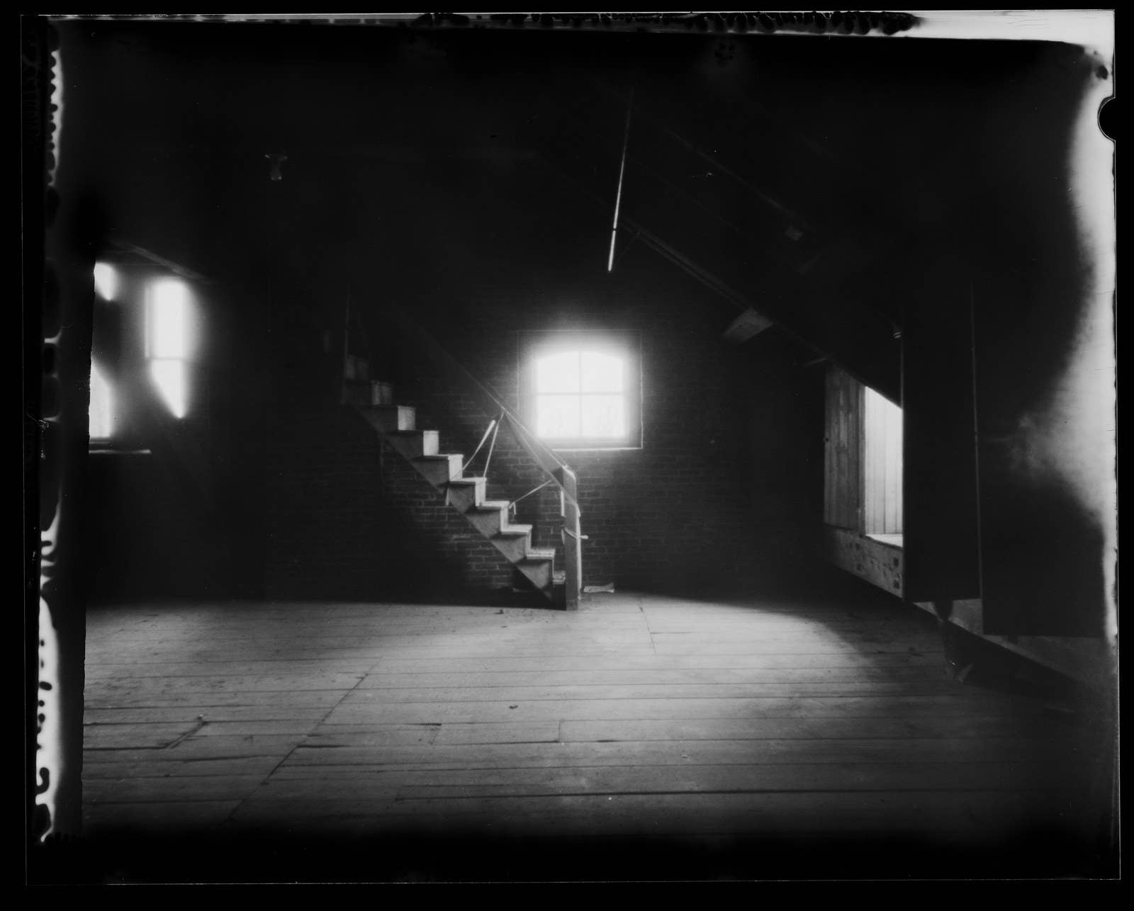 A pinhole photograph of the attic at St. Joseph’s Orphanage.