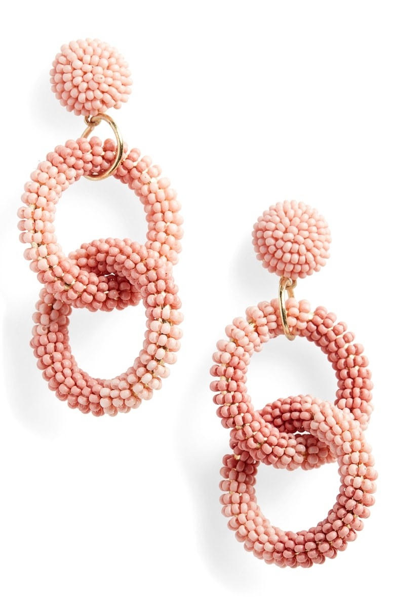 Promising review: "I absolutely love these earrings! I was worried they were going to be heavy, but they are lightweight — I wore them all day long. They are a beautiful peach color!" —KlparhamGet them from Nordstrom for $18.