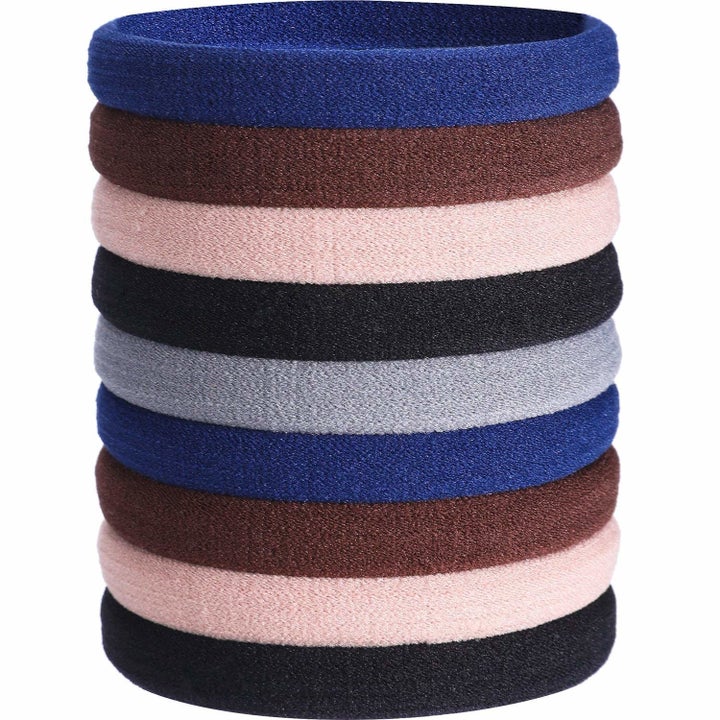 The hair ties in blue, brown, black, and pink