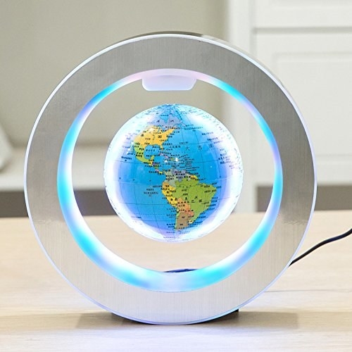 A circular light with a floating globe in the center of it. The globe floats with magnets and the lights on the inside and outside of the circle glow when plugged in. 