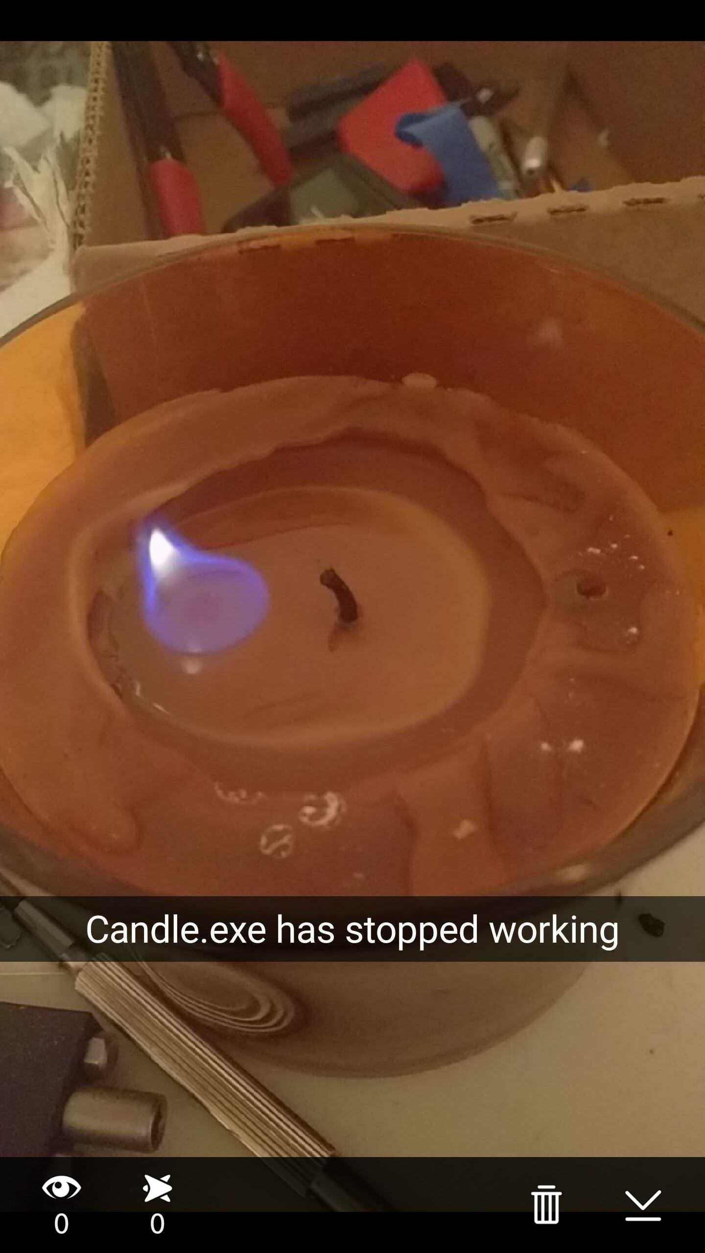 a flame in wax not on the wick of the candle