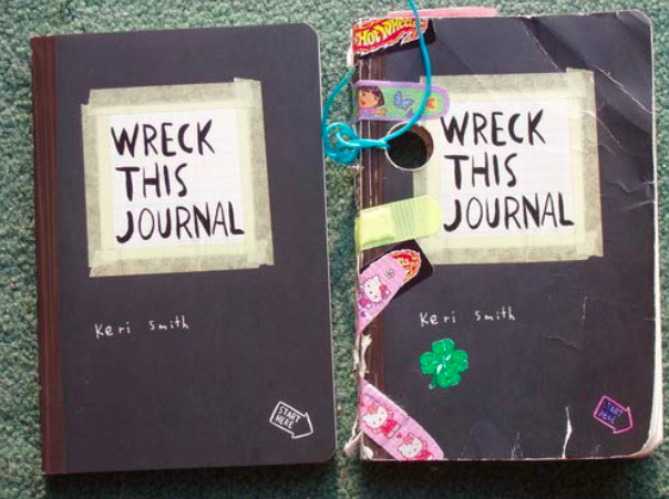 On the left, the new journal. On the right, the journal all beat up, with a hole drilled in it and adhesive bandages stuck on it