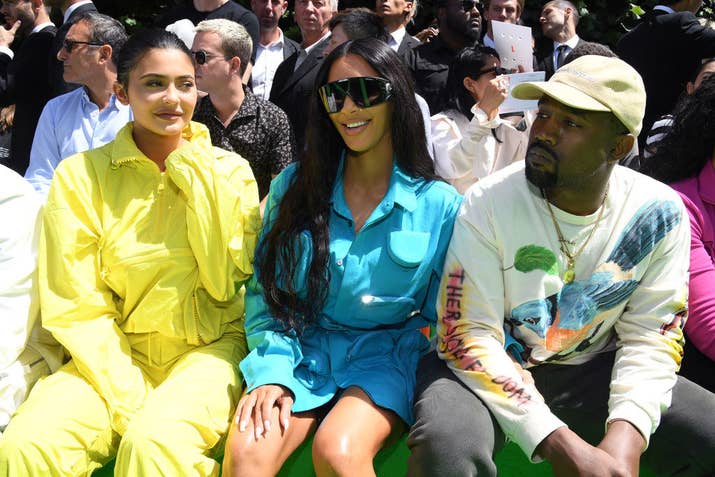 (Left to right) Kylie Jenner, Kim Kardashian and Kanye West attend the Louis Vuitton Menswear Spring/Summer 2019 show.