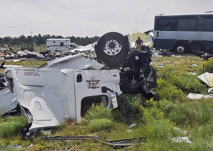 First responders work at the scene of the collision Thursday.