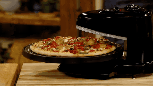 Promising review: "We use the Pizzazz for almost everything — French fries, cheese bread, breaded chicken, etc. It is also fantastic for roasting veggies. I love not having to turn the oven on, and it's big enough to make plenty of food for our three-person family. I will never go without a Pizzazz, it's far too useful. The tray cleans easily, but you can use foil for zero-maintenance cleanup. This is the only toaster oven you'll ever need, and it does a lot more than a regular toaster oven because there's more cooking space." —KaetraGet it from Walmart or Jet for $49.90.