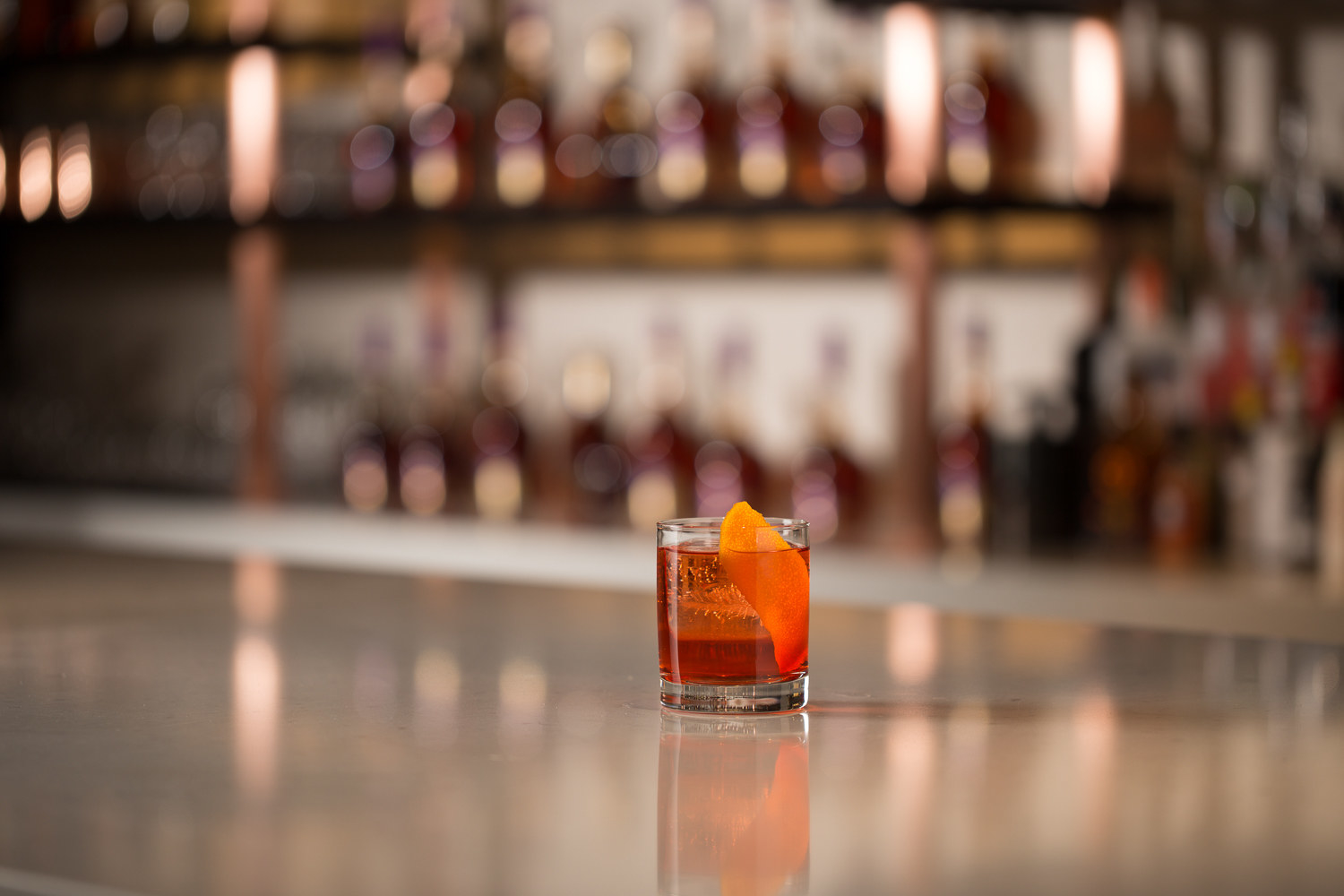 1 ½ parts Courvoisier® V.S.O.P Cognac1 part dry vermouth¾ parts Campari® LiqueurOrange for garnish Pour ingredients in an old fashioned glass, add ice and stir. Garnish with an expressed orange swath.