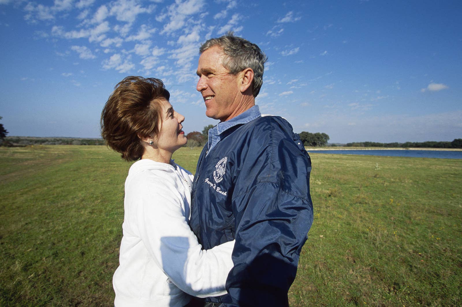 George W. Bush and his wife, Laura, share a hug at their Texas ranch while awaiting the results of the 2000 presidential election recount in November 2000.
