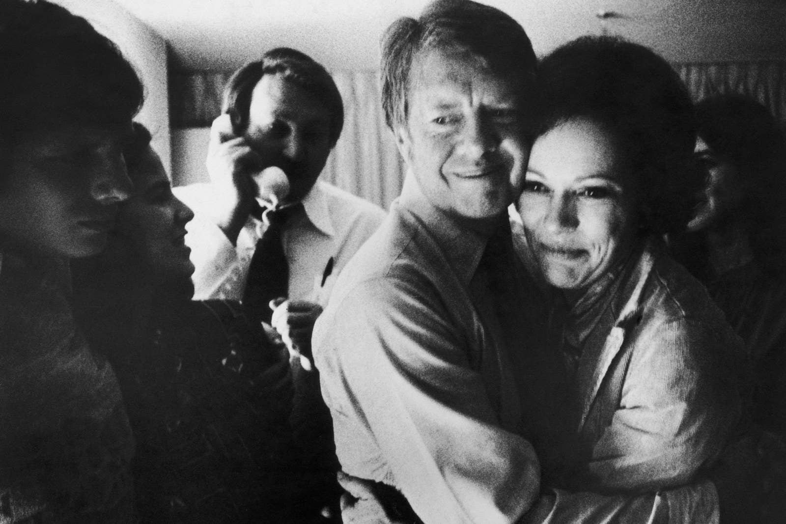 Democratic presidential candidate Jimmy Carter embraces his wife, Rosalynn, after receiving the final news of his victory in the national general election on Nov. 2, 1976.