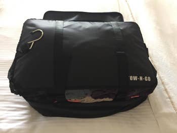 reviewer's packing cube with clothes in it
