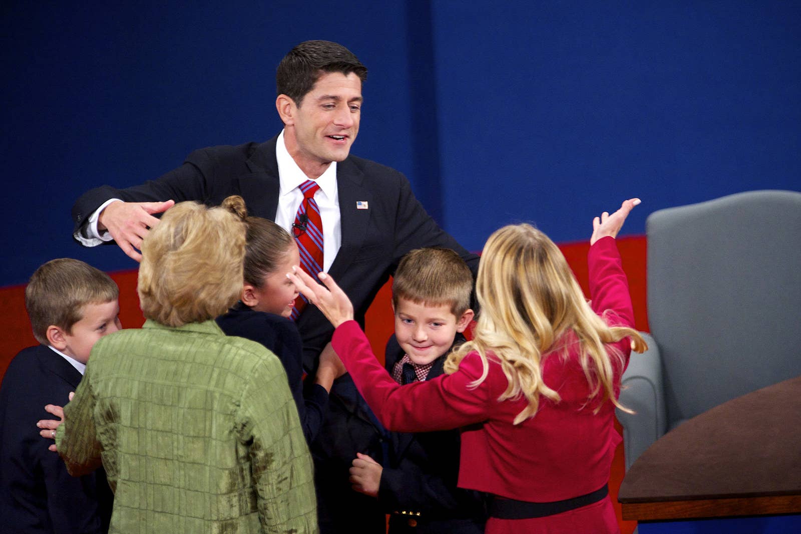 Rep. Paul Ryan is surrounded by his family after participating in the vice presidential debate with Vice President Joe Biden, in Danville, Kentucky, on Oct. 11, 2012.