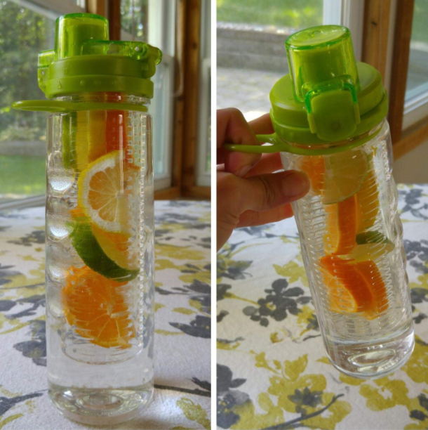 reviewer photo of the clear bottle with citrus in the inner infuser 