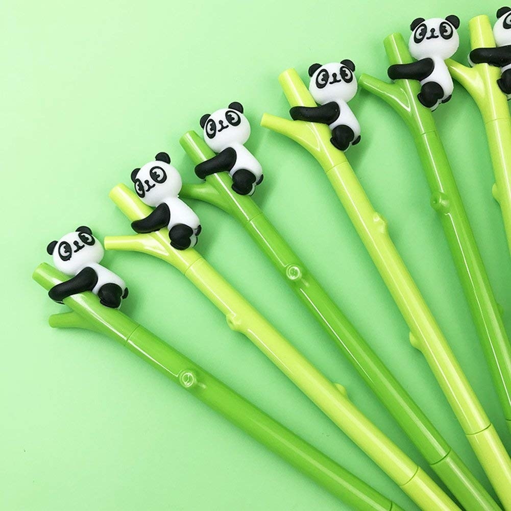 the pens that look like bamboo stalks with a panda holding on to the top, with caps