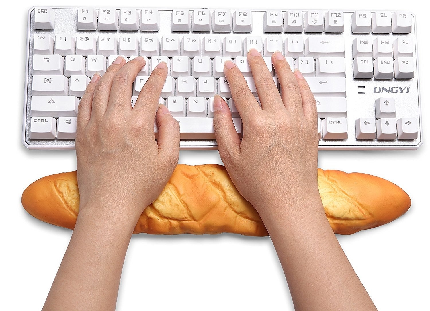 Get it from Amazon for $12.99.Promising review: "I'm using this as we speak, and it still cracks me up every day. Every time someone new walks into my office they think it is real bread — it is incredibly realistic looking. It is softer than any wrist rest I have ever had, I have carpal tunnel and I'm in software where not typing isn't really an option, so to have something that is incredibly comfortable, and makes me smile every time I look at it is incredibly worth it! Don't underestimate the value in having something that makes the mundane a little more fun. And FYI, the packaging will also crack you up!" —Daryl-Ann