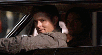 GIF of actor from TV show Supernatural winking at the camera