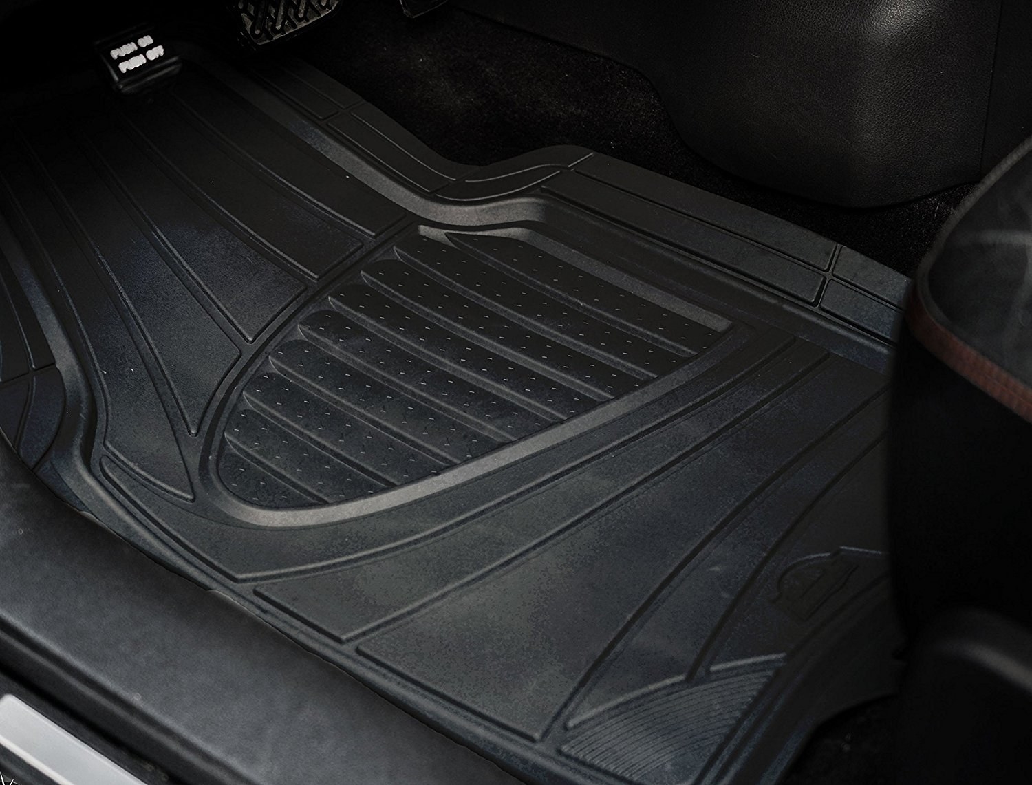 The mats on the floor of a car