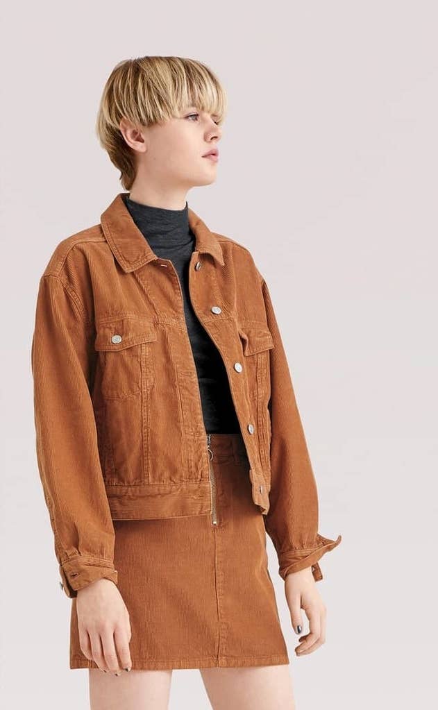 Promising review: "This jacket is a super cute cut. It is not too short and hits right above the hips. It's cute and boxy and not too oversize. The material is strong and thick and looks like it will last for many years. The color is more burnt in person, which is more attractive than an orange color. SUPER cute jacket." —MeghmPrice: $90 (available in sizes 2–12)