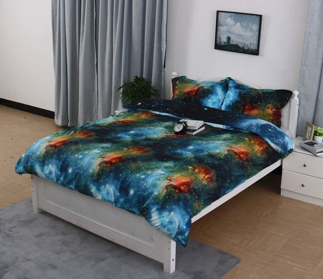 the galactic duvet set with a galaxy print on the sheets and pillows