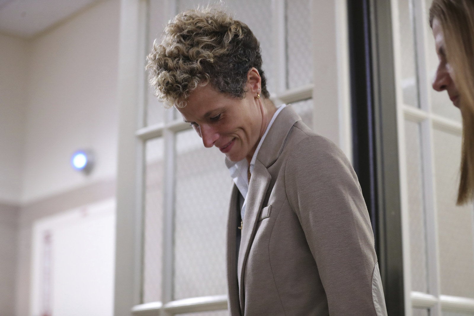 Andrea Constand leaves after the first day of the sentencing hearing.